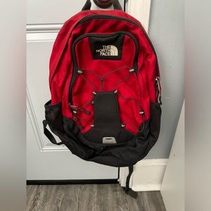 Red and Black North face Backpack
